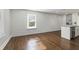 Spacious dining area with hardwood floors and kitchen island at 1084 Fairburn Nw Rd, Atlanta, GA 30331