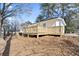 House exterior with deck and pine straw landscaping at 1084 Fairburn Nw Rd, Atlanta, GA 30331