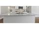 Modern kitchen island with granite countertop and stainless steel sink at 1084 Fairburn Nw Rd, Atlanta, GA 30331