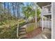 Steps leading to a patio and fenced backyard at 2006 Augusta Se Dr, Marietta, GA 30067