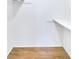 Spacious closet with wood flooring and ample shelving at 2006 Augusta Se Dr, Marietta, GA 30067