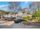 Tan multi-unit building with parking and landscaping at 2006 Augusta Se Dr, Marietta, GA 30067