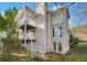 Multi-level building with a wooden deck and stairs at 2006 Augusta Se Dr, Marietta, GA 30067