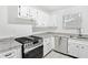 Modern kitchen with stainless steel appliances and granite countertops at 2006 Augusta Se Dr, Marietta, GA 30067