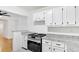 Updated kitchen with stainless steel appliances and granite countertops at 2006 Augusta Se Dr, Marietta, GA 30067