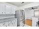 Bright kitchen featuring stainless steel appliances and white cabinets at 2006 Augusta Se Dr, Marietta, GA 30067
