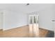 Living room with hardwood floors, fireplace and sliding glass doors at 2006 Augusta Se Dr, Marietta, GA 30067