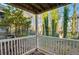 Private patio with white railing and wooded views at 2006 Augusta Se Dr, Marietta, GA 30067