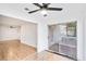 Sunroom with hardwood floors and sliding glass doors at 2006 Augusta Se Dr, Marietta, GA 30067