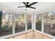 Sunroom with hardwood floors and multiple windows at 2006 Augusta Se Dr, Marietta, GA 30067