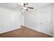 Bedroom with ceiling fan, neutral carpeting and wainscoting at 390 Highpoint Xing, Powder Springs, GA 30127