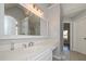 Bright bathroom vanity with ample storage, designer fixtures and tile floors at 54 Etham Pl, Douglasville, GA 30134