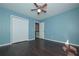 Bedroom with hardwood floors and a view to the hallway at 54 Etham Pl, Douglasville, GA 30134