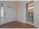 Welcoming foyer with hardwood floors, and a view of the half-bathroom with pedestal sink at 54 Etham Pl, Douglasville, GA 30134