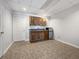 Small kitchen with cabinets and a mini-fridge at 60 Legend Creek Holw, Douglasville, GA 30134