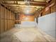 Unfinished basement area with partial flooring at 60 Legend Creek Holw, Douglasville, GA 30134