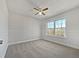 Spacious bedroom with neutral carpeting and large window at 60 Legend Creek Holw, Douglasville, GA 30134