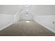 Bright and airy bonus room with carpet flooring at 60 Legend Creek Holw, Douglasville, GA 30134