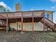 Two story deck with stairs leading to the backyard at 60 Legend Creek Holw, Douglasville, GA 30134