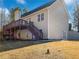 House with a large deck and stairs leading to the yard at 60 Legend Creek Holw, Douglasville, GA 30134