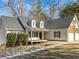 Two-story house with a front porch and two-car garage at 60 Legend Creek Holw, Douglasville, GA 30134