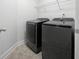 Laundry room with modern washer and dryer at 60 Legend Creek Holw, Douglasville, GA 30134