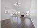 Bright living room featuring hardwood floors, fireplace, and vaulted ceilings at 60 Legend Creek Holw, Douglasville, GA 30134