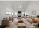 Virtually staged living room with vaulted ceiling, fireplace, and ample natural light at 60 Legend Creek Holw, Douglasville, GA 30134