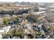 An aerial view of the surrounding neighborhood with a skyline in the distance at 727 Berkeley Nw Ave, Atlanta, GA 30318