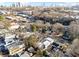 An aerial view of the surrounding neighborhood, skyline, and local body of water at 727 Berkeley Nw Ave, Atlanta, GA 30318