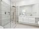 Modern bathroom with a frameless glass shower, stylish tile, and sleek fixtures at 727 Berkeley Nw Ave, Atlanta, GA 30318