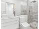 Sleek bathroom featuring a glass shower, modern vanity, and stylish fixtures at 727 Berkeley Nw Ave, Atlanta, GA 30318
