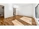 Sunlit bedroom featuring hardwood floors, closet, and access to a luxurious ensuite bathroom at 727 Berkeley Nw Ave, Atlanta, GA 30318