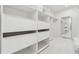 Spacious walk-in closet with custom shelving, drawers and a full-length mirror at 727 Berkeley Nw Ave, Atlanta, GA 30318