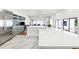 Open kitchen features a large center island, stainless steel appliances, and light blue cabinets at 727 Berkeley Nw Ave, Atlanta, GA 30318
