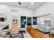 Stylish living area featuring hardwood floors, modern furniture, and a view to the exterior at 727 Berkeley Nw Ave, Atlanta, GA 30318