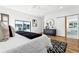 Spacious main bedroom with hardwood floors, sliding barn door closet, and lots of light at 727 Berkeley Nw Ave, Atlanta, GA 30318