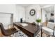 Well-appointed office featuring a large wooden desk and a designer chair at 727 Berkeley Nw Ave, Atlanta, GA 30318