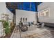 Outdoor patio with modern furniture and serene landscaping for relaxing or entertaining at 727 Berkeley Nw Ave, Atlanta, GA 30318