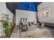 Outdoor patio with lush greenery and comfortable seating for stylish relaxation at 727 Berkeley Nw Ave, Atlanta, GA 30318