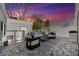 Stylish patio with modern furniture, ideal for outdoor entertaining with beautiful sunset views at 727 Berkeley Nw Ave, Atlanta, GA 30318