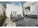 Outdoor patio with modern seating and beautiful landscaping, great for relaxing and entertaining at 727 Berkeley Nw Ave, Atlanta, GA 30318
