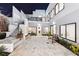Expansive patio with stairs to balcony, bench, and modern design, creating a tranquil outdoor retreat at 727 Berkeley Nw Ave, Atlanta, GA 30318