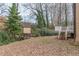View of the backyard showing a shed, bridge, and second story deck at 3847 Admiral Dr, Chamblee, GA 30341