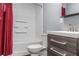 Bathroom featuring a bathtub with a shower and modern wooden vanity at 3847 Admiral Dr, Chamblee, GA 30341