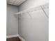 Walk-in closet featuring white wire shelving and a hardwood floor at 3847 Admiral Dr, Chamblee, GA 30341