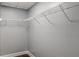 Walk-in closet with white wire shelving and light gray paint at 3847 Admiral Dr, Chamblee, GA 30341