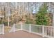Spacious deck with wooded view and railing at 3847 Admiral Dr, Chamblee, GA 30341