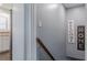 Inviting entryway with welcome home decor and glimpses of the kitchen's granite countertops and white cabinetry at 3847 Admiral Dr, Chamblee, GA 30341