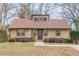 A cozy single-story home with neutral siding and a manicured front lawn at 3847 Admiral Dr, Chamblee, GA 30341